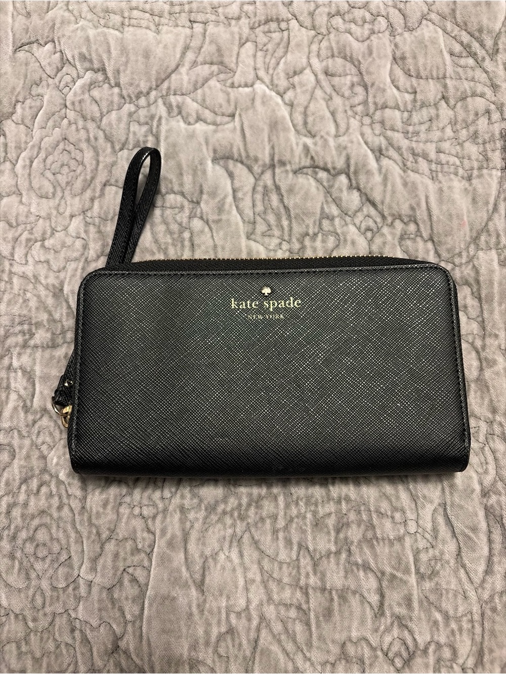 kate spade black saffiano zip wristlet clutch with gold logo